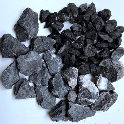 China Contemporary Small Granite Paver Natural Color Pebble Tile Black Color Pebbles And Stones for sale