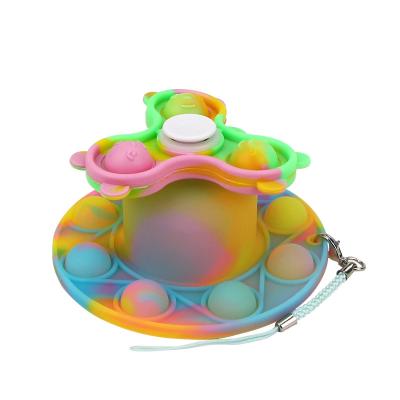 China Viable Silicone Rainbow Link Sensory Dye Glow Luminous Halloween Pumpkin Push Noise Bubble Moving Person Toy for sale