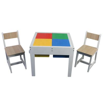 China XKF002 Modern Wooden Kids Play Table With Storage Cloth Bins 2020 Kids Furniture for sale