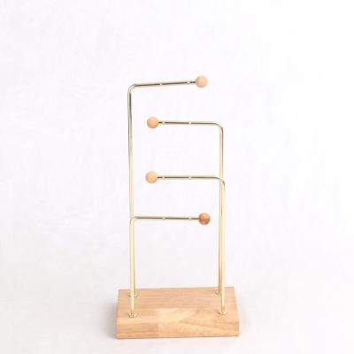 China Fashion Earring High End Stand Metal Jewelry Display Stand Gold Wooden Low Table Rack for sale