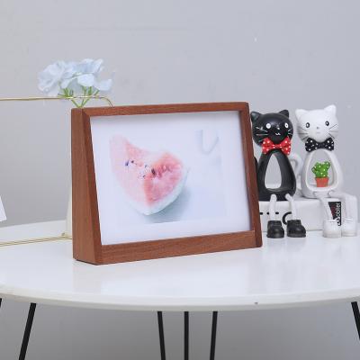 China Modern and simple modern solid wood photo frame 6 inches 8 inch frame wooden U-shaped desktop photo frame customization for sale