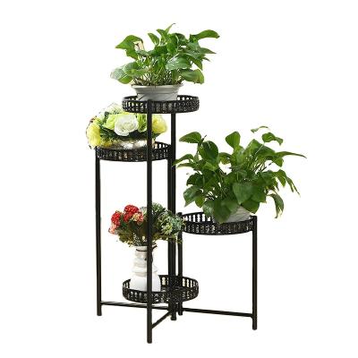 China Modern European style wrought iron 4 layers flower stand, adjustable metal flower pot rack with 4 trays for sale