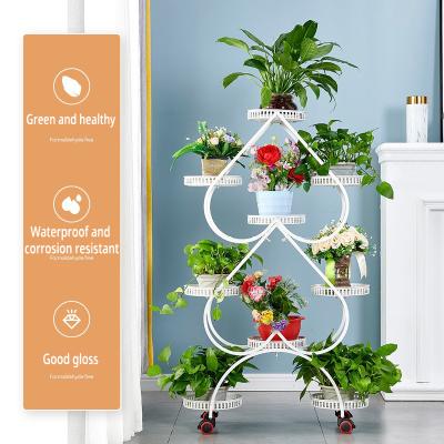 China Wholesale 2021 New Modern Flower Stand Gardening Heart Shape 9-Piece Multi-Layer Iron Plant Stand Flower Por Stands for sale