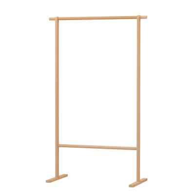 China (Others)Adjustable Nordic Solid Wood Modern Minimalist Floor To Ceiling Clothes Rack Clothes Rack Clothing Store Display Rack for sale