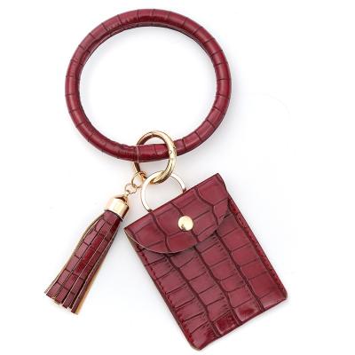 China New Stain PU Key Chain Bracelet Tassel Leather Bracelet Durable Stone Pendant Grain Zero Purse for sale