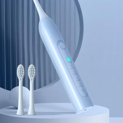 China Multi-speed Adjustment Travel Electric Toothbrush Spinning Braces Cordless Charging Electric Toothbrush for sale