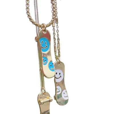 China Fashion Jewelry Hiphops Happy Face Pendant Necklace Fashion In October 2021 Gold Plated Pave Skateboard Pendant Necklace for sale