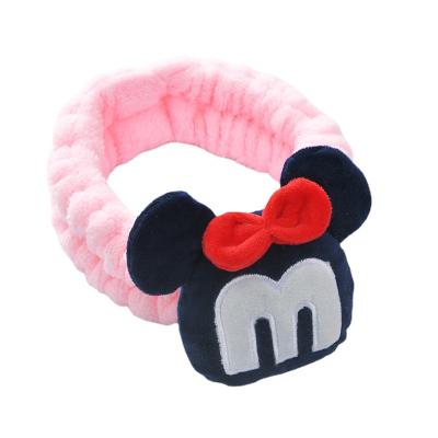 China Soft M letter cartoon sports headband make up facewash headband women's headwear spa facewash headband elastic head wash for sale