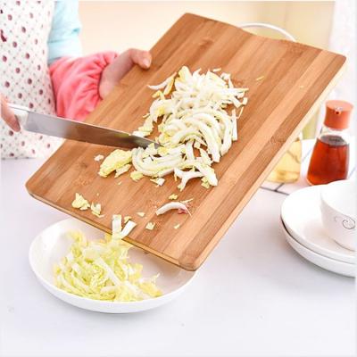 China Amazon Best Sustainable Selling Wooden Handle Bamboo Cutting Board Kitchen Utensil for sale