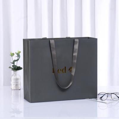 China Custom Shopping Bag Reused Tote White Paper Gift Bags New Arrivals Materials 2022 With Logo Cardboard Reusable Cloth Shopping Bag for sale