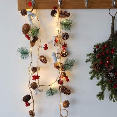 China Superb Creative Christmas Decor Pinecone Bell Fairy String Light Mars Berry Decor Dangling Fairy Lights for sale