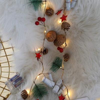 China Fairy String Light March Pinecone Bell Stunning Creative Berry Decor Christmas Decoration Led Cherry Blossom Tree Light for sale