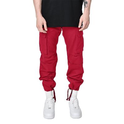 China Comfortable Mens Jogger Cargo Pants With Slash Pockets Elastic Edges Loosen Style Sport Tracksuit for sale