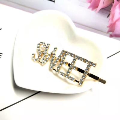 China Silver Fashion Metal Word Hair Clip Accessories Bridal Crystal Rhinestone Paved Letter Hair Pin à venda