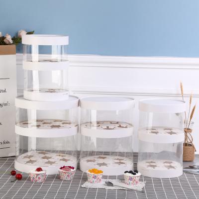 China 2021 hot sale french style PET clear round cake box 2 layers wedding birthday cake box with paper cover 22*22*13+15cm for sale