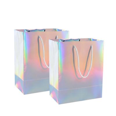 China Other Gift & New arrival shinny craft rainbow paper gift bag christmas paper holographic paper gift packaging bags for sale