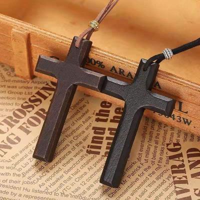 China Handmade Wooden Cross Necklace Christian Long Necklace For Couple Vintage Hiphop With Leather Chain for sale