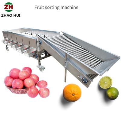 China Ball Pomegranate Roller Fruit Sorting Machine for Tomato Apple Avocado Onion Potato en venta