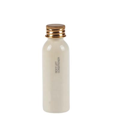 China Household Products Cosmetic Bottle Plastic Shampoo 40ml Hotel Lotion Bottle With Gold Cap for sale