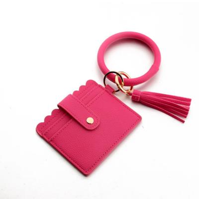 China Environmentally Friendly Leather Accessories Ring Bangle Keychain PU Floral Print Tassel Wallet Wristband Pocket Car Holder Women Keychain for sale