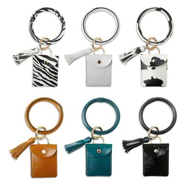 China Large Circle Wristband Keychain Wristband Touchless Leopard Elevator Tassel Keychains Wristband Leather Door Opener Leather for sale