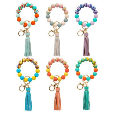 China European And American Newest Food Grade Leather Colored Silicone Wristband New Water Transfer Key Chain for sale