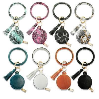 China New Design Leather Around The Ring Bracelet Earphone Cases With Makeup Key Mirror PU Leather Pocket Wristband Keychain for sale