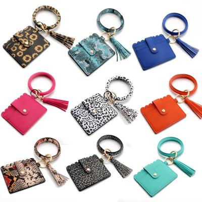 China Amazon Fashionable Hot Sale PU Card Holder Leather Wristlet Matching Bag For Women Wristband Key Chain Set for sale