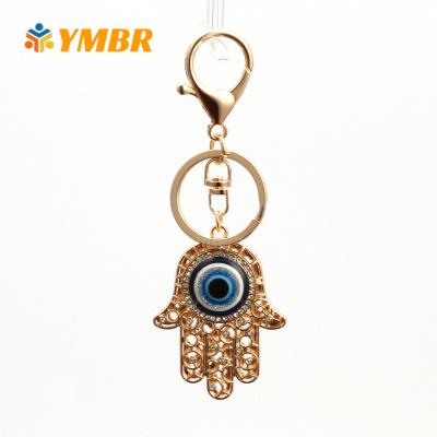 China Fashionable Exquisite Zircon Circle Evil Eyes Hand Diamond Blue Devil Ring Gold Plated Key Chain for sale