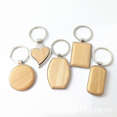 China Promotion Gift Custom Design Laser Print Wooden Key Indicator Engraved Blank Personalized Wooden Name Walnut Key Chain for sale