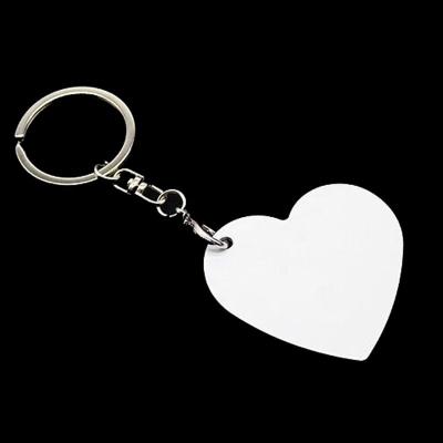 China Europe Memorabilia Photo Heat Press Double-sides Love Heart Keychain Pendant Sublimation Keychains for sale