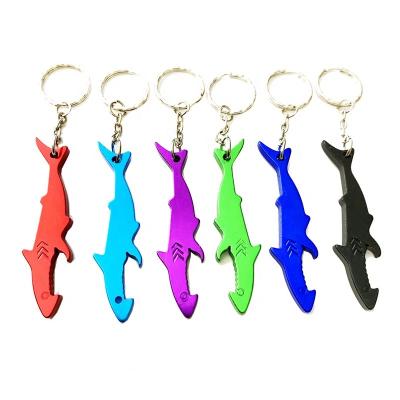 China Sustainable Hot Sale Engraved Metal Aluminum Shark Shaped Beer Wine Bottler Opener Keychains for sale