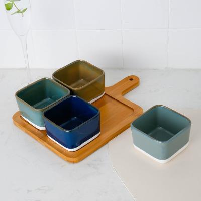 China Sustainable Newcomer Customize Snack Reactive Glazed Ceramic Deep Bowls Adjust Shape Porcelain Serving Dish With Bamboo Tray for sale