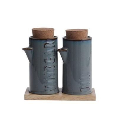 China Sustainable Unique Design Kitchen Used Ceramic Dressing Bottle Set With Tray , Reactive Gloss Gray Ceramic Olive Oil Bottle With Lid for sale