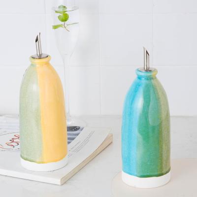 China Viable Modern Eco-Friendly Decorative Porcelain Oil Jar Kitchen Style Olive Oil Vinegar Reactive Glazed Ceramic Bottle for sale