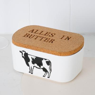 China Hote Selling Viable Home Used Decorative Design Rectangle Cow Butter Box Porcelain White Ceramic Butter Dish With Wooden Lid for sale