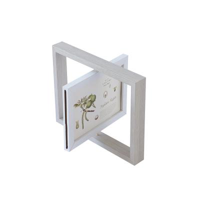 China Environmental friendly picture frame new year style box 4r gift makers first beams white wholesale display prop to rotate rotating photo frame for sale