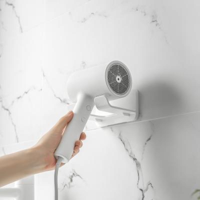 China Viable Hot Sale Bathroom Self Adhesive Shopee Fan Holder Hair Dryer Organizer Holder for sale