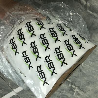 China Custom Printed PE Moisture Proof Plastic Pre Opened Pop On Roll Bags White Printed Pop On Roll Packaging Perforated Bags On A Roll for sale