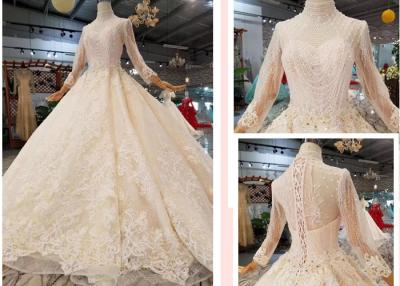 China Hand-made new champagne-coloured luxury crystal long-sleeved trailing lace wedding dress in autumn and winter for sale