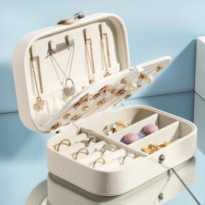 China Large capacity Portable Travel Jewelry Case For Earrings Rings Necklaces Double Layer Jewelry Display Holder Travel Jewelry Boxes for sale