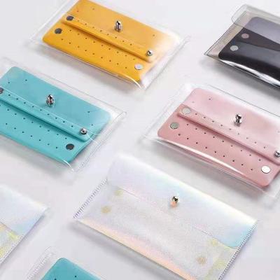 China Portable Jewelry Tpu Jewelry Storage Box Stud PU Leather Stud Earrings Necklace Envelope Universal Bag Travel Storage Bag for sale