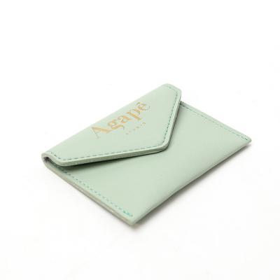 China Wholesale Luxury Green Printed Leather Jewelry Pouch Magnet Closure Jewelry Gift Bag for sale