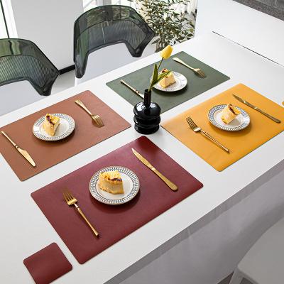 China Cheap Place Stocked Mats Hot Sale Plain Placemat Table Mat Double Color Placemat Leather Place Mat for sale