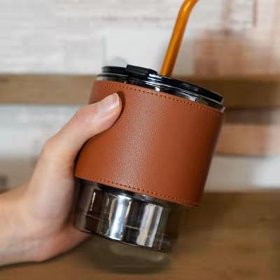 China CLASSIC original style retro elder accompany creative portable leather wind carrier INS coffee cup cover coffee cup sleeve holder for sale