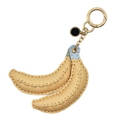 China Soft 3D PU Leather Banana Keychains Holder Manufacturer Custom Fruit Key Chain for sale