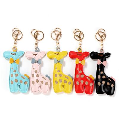 China Cute Hot Sale Leather Cartoon PU Giraffe Key Chain Pendant Embroidered Deer Hollow Bag PU Giraffe Pendant Key Ring for sale