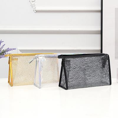 China Hot Fashion Summer TPU Cosmetic Bag Gold And Silver Cosmetic Bag Large Capacity Storage Bag Splash Water for sale