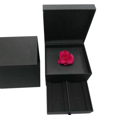 China Recyclable Black Book Customized Style With Two Drawers Rigid Jewelry Paper Packaging Gift Box With Flower for sale