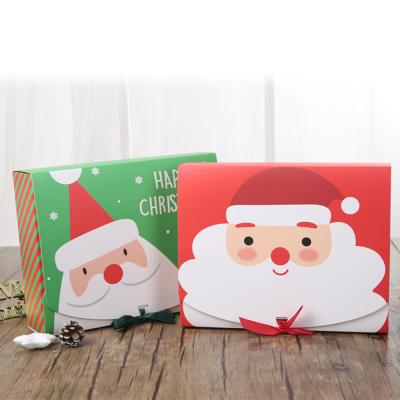 China Recyclable Custom Christmas Candy Candy Cookie Packaging Baking Paper Gift Box With Bow Santa Claus Decoration for sale